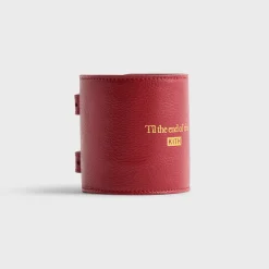 Bougeoir ajustable en cuir Saffiano monogrammé Kith