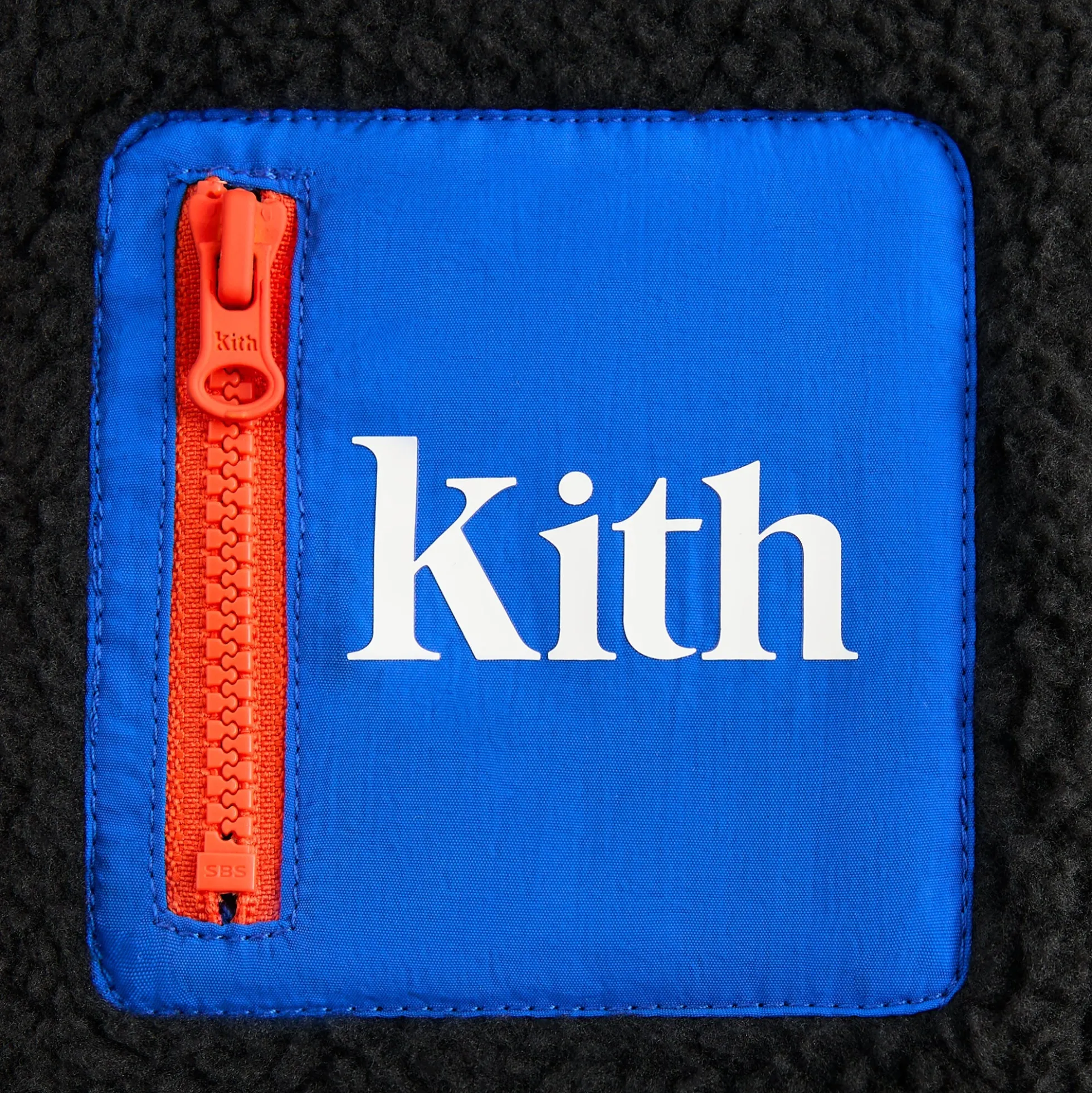 Combinaison Kith Baby Antony en sherpa color-block