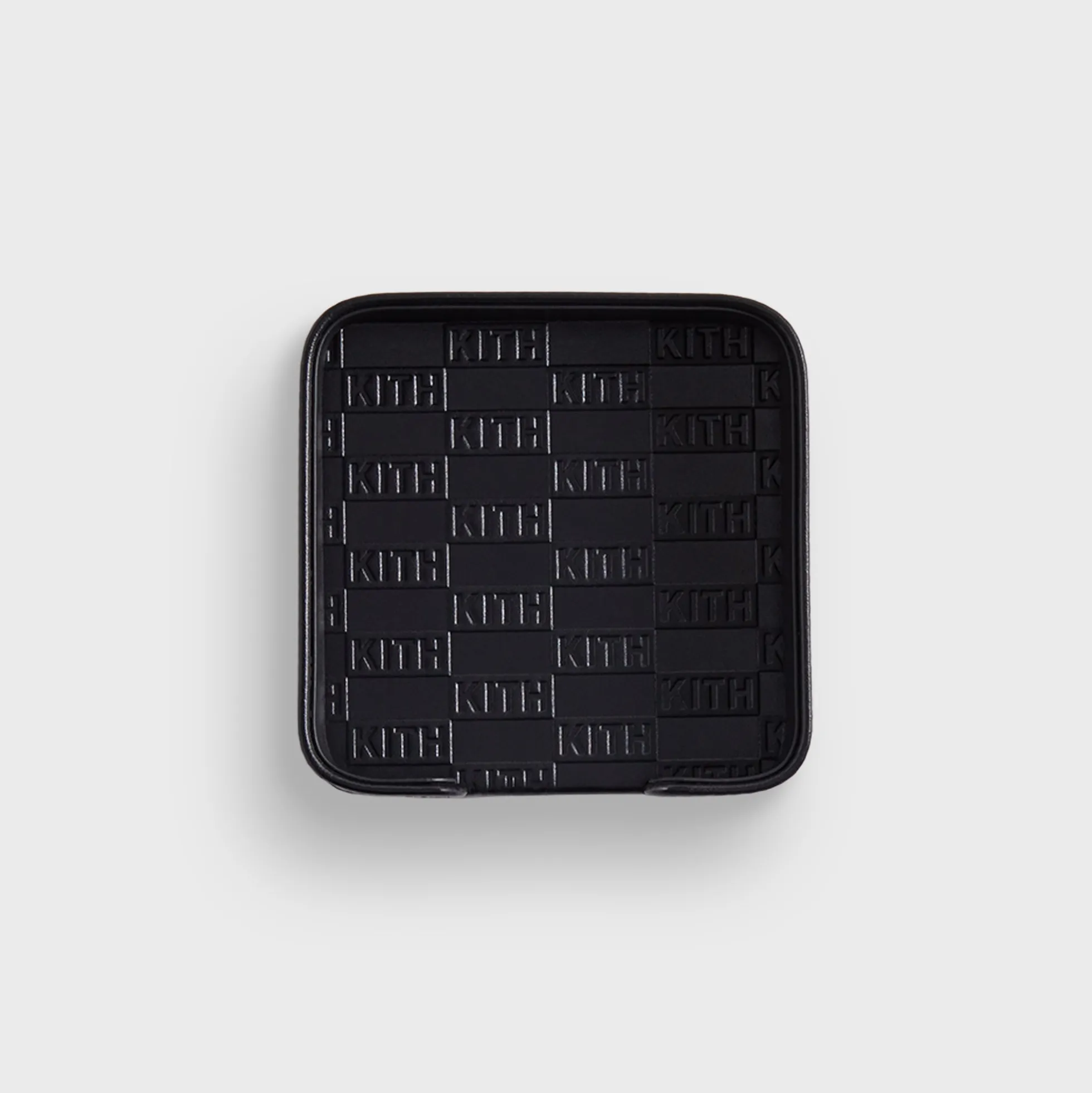 Dessous de verre en cuir monogramme Kith