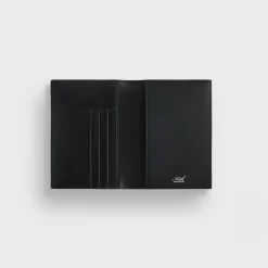 Porte-passeport en cuir monogrammé Kith