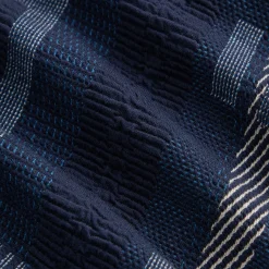 Trench-coat court Kith Everett