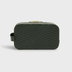 Trousse de toilette en cuir monogrammé Kith