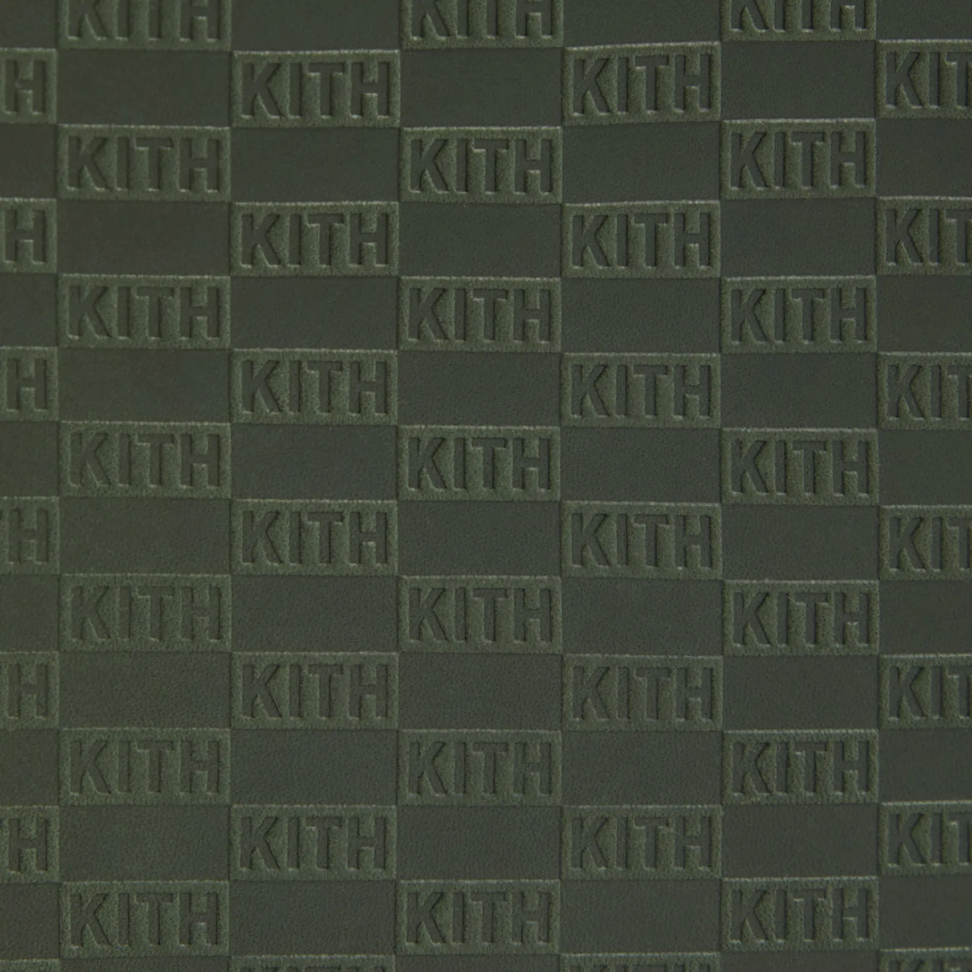 Trousse de toilette en cuir monogrammé Kith