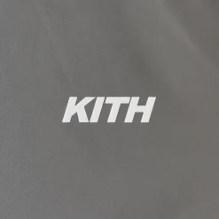 Veste asymétrique réfléchissante Kith Akari pour femme
